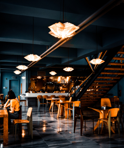 Modern restaurant interior with wooden furniture
